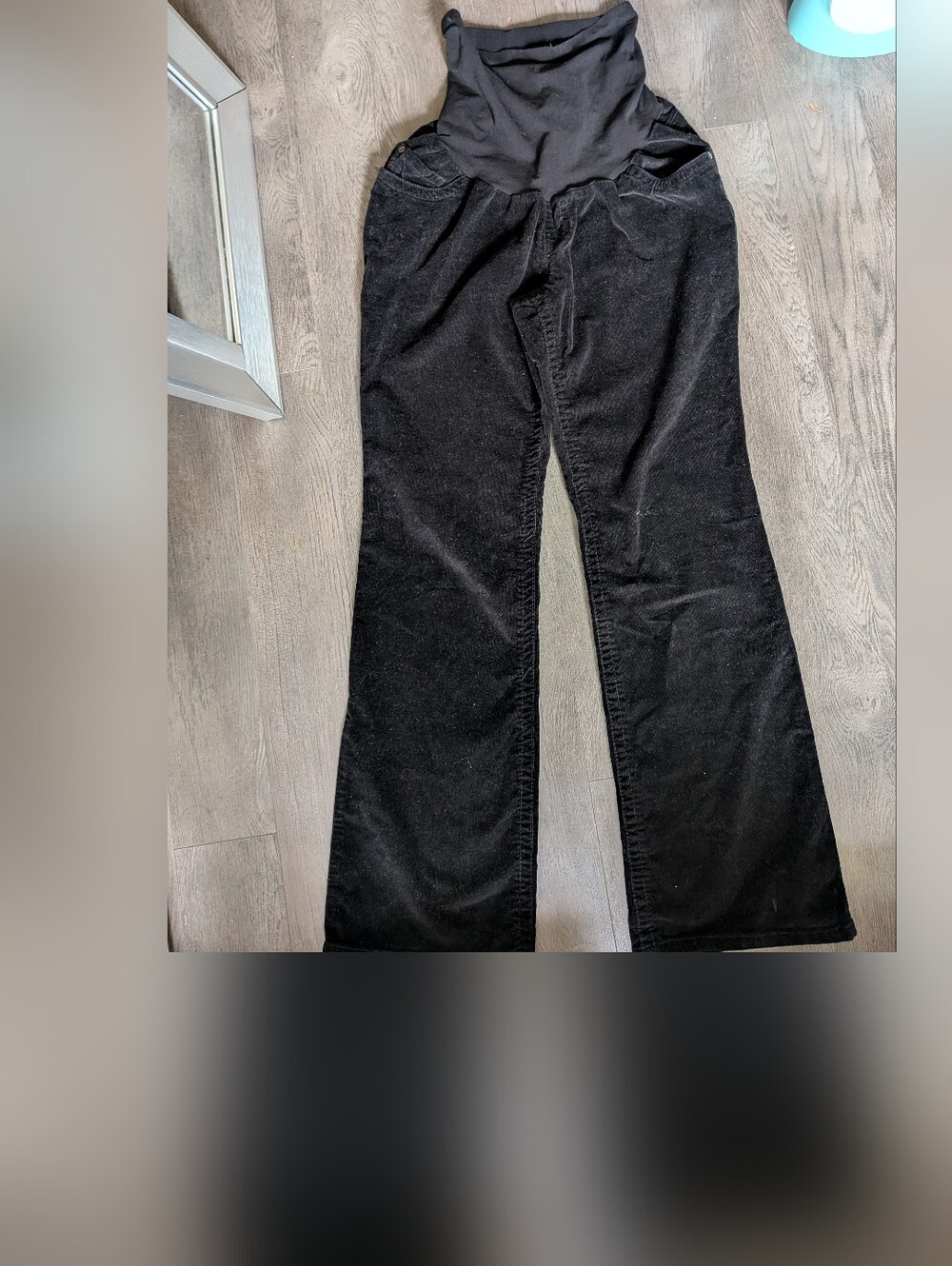 Motherhood Black Maternity Label Close-Up